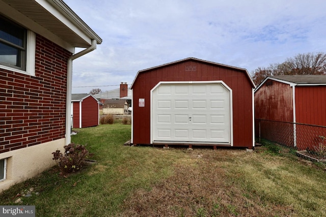 garage featuring a yard