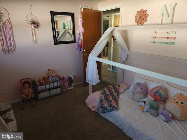 bedroom with dark carpet