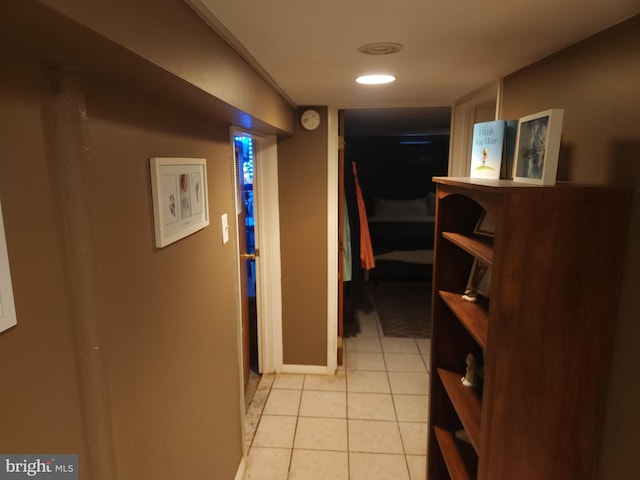 hallway with light tile patterned floors