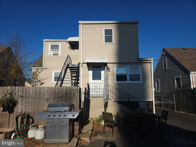 rear view of house with a patio area