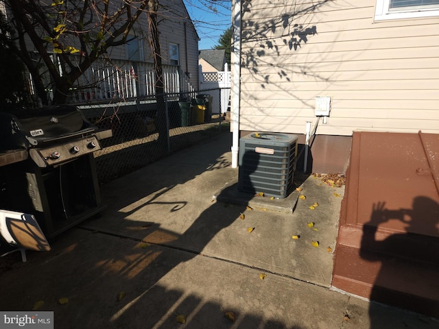 view of patio / terrace with grilling area and central AC