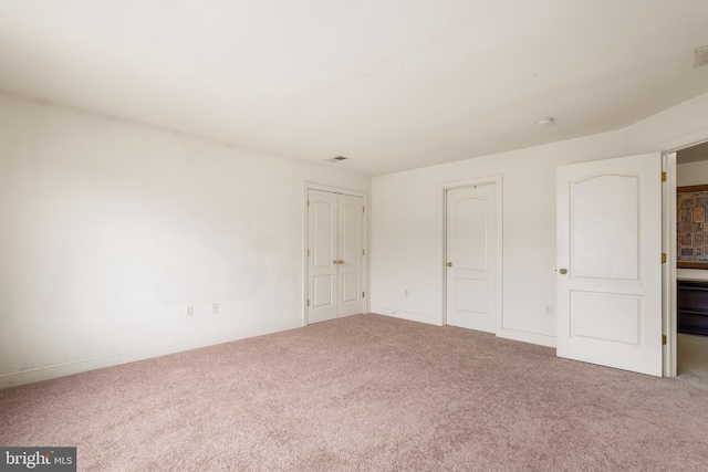 unfurnished bedroom featuring carpet floors