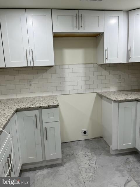 clothes washing area featuring electric dryer hookup