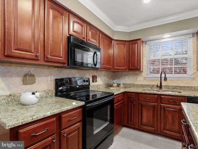 kitchen featuring black appliances, light stone countertops, ornamental molding, and sink