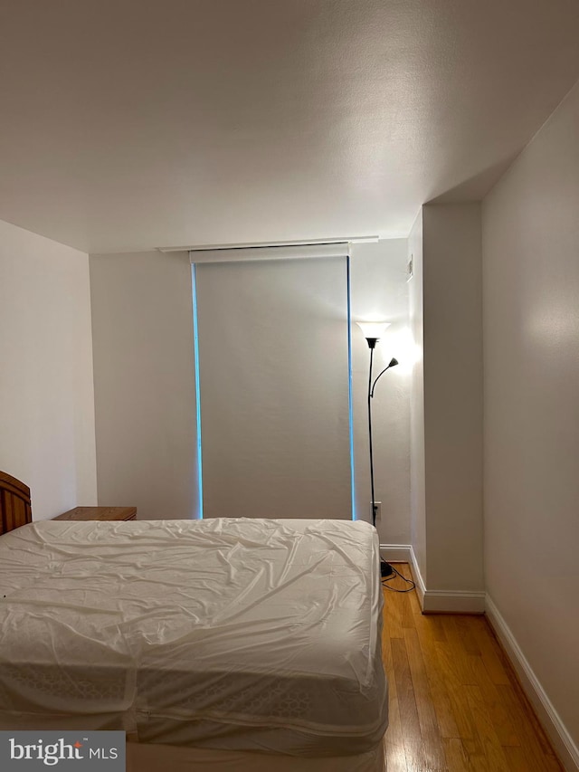 unfurnished bedroom with light hardwood / wood-style floors