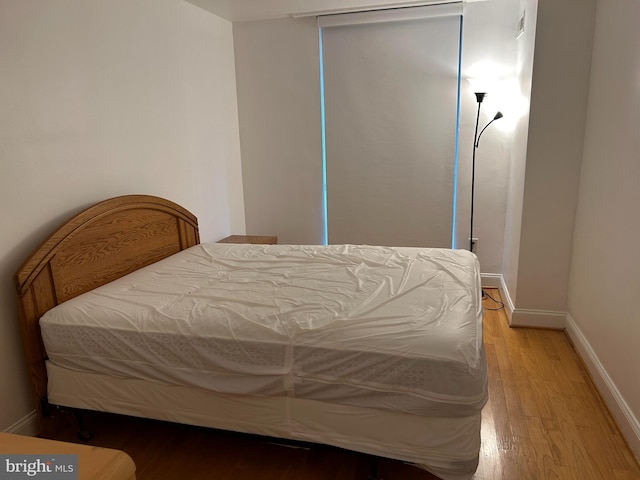 bedroom featuring hardwood / wood-style flooring