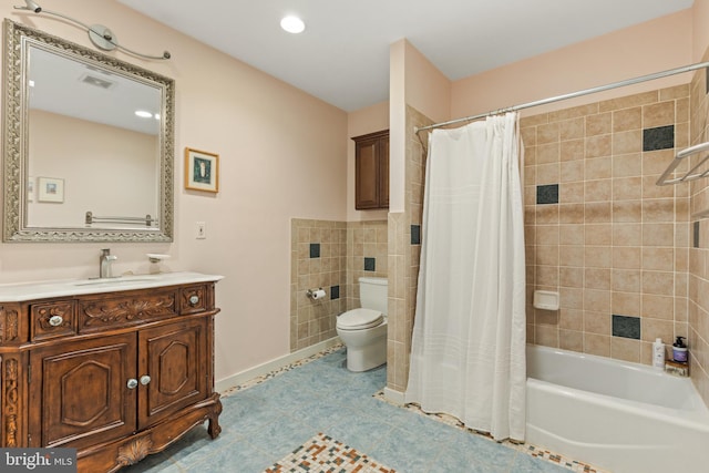 full bathroom with tile patterned floors, vanity, toilet, and shower / tub combo with curtain