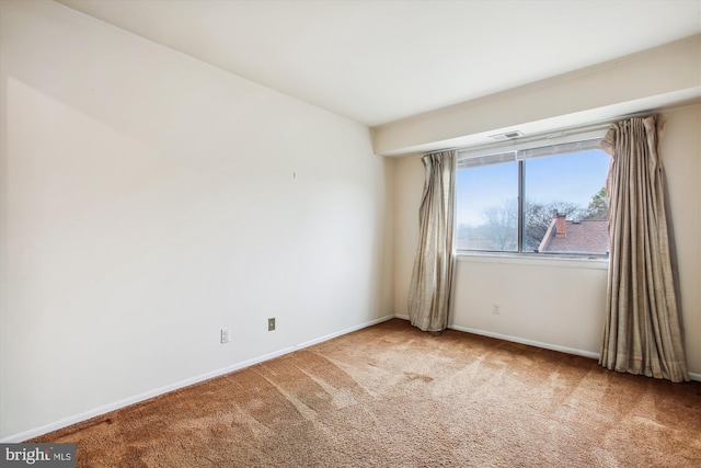 unfurnished room with carpet