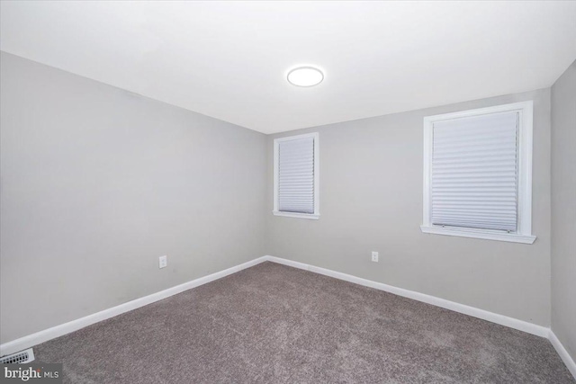 view of carpeted spare room