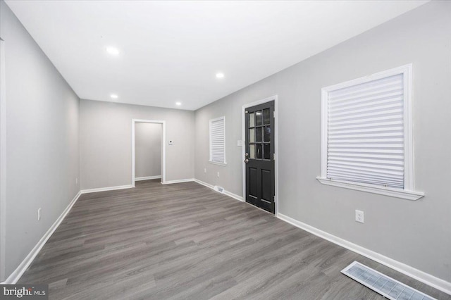 empty room featuring hardwood / wood-style floors