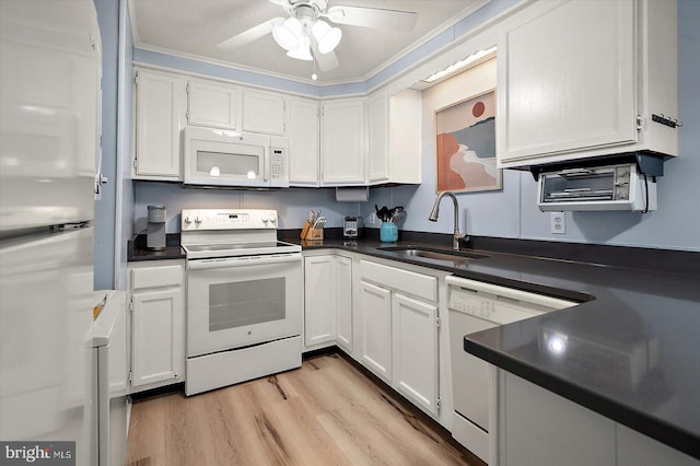 kitchen featuring white appliances, white cabinets, sink, light hardwood / wood-style flooring, and ornamental molding