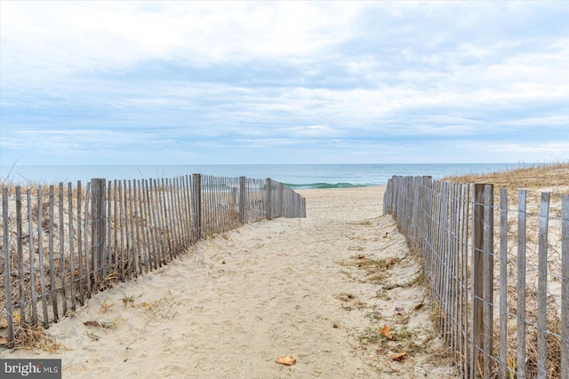 property view of water with a beach view