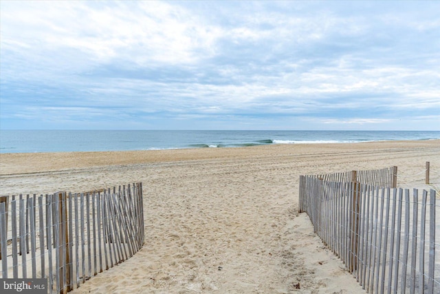 water view featuring a beach view