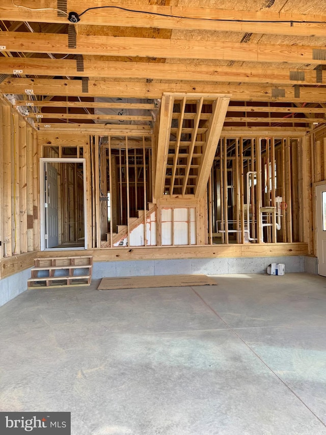 miscellaneous room with concrete floors and a wealth of natural light