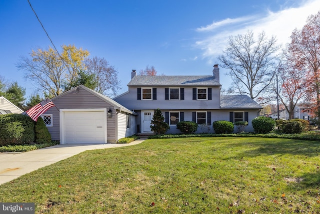 view of front facade featuring a garage and a front lawn