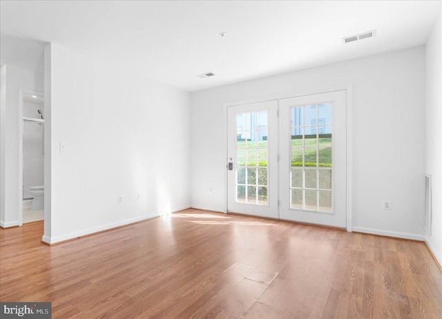 empty room featuring light wood-type flooring