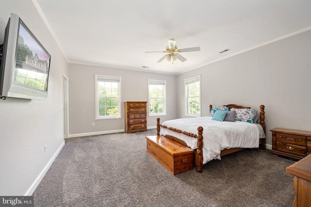 carpeted bedroom with ceiling fan and crown molding