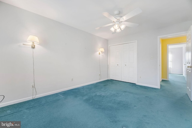 unfurnished bedroom featuring carpet, a closet, and ceiling fan