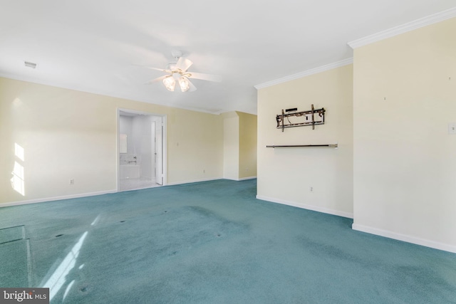 carpeted empty room featuring ceiling fan and crown molding