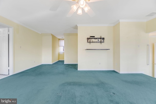 empty room with ceiling fan, ornamental molding, and carpet floors