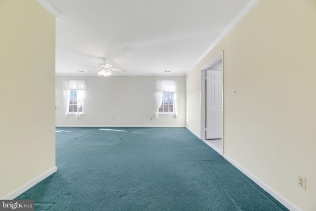 spare room featuring carpet, ceiling fan, and ornamental molding