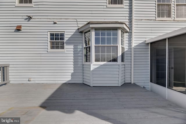 deck featuring a sunroom