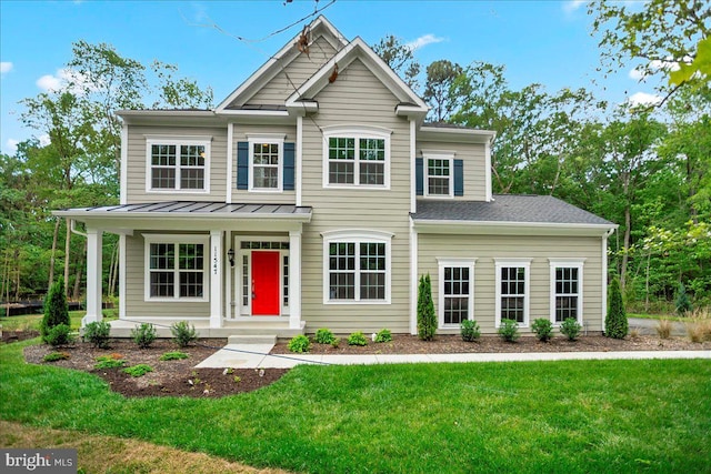 view of front of property featuring a porch and a front yard