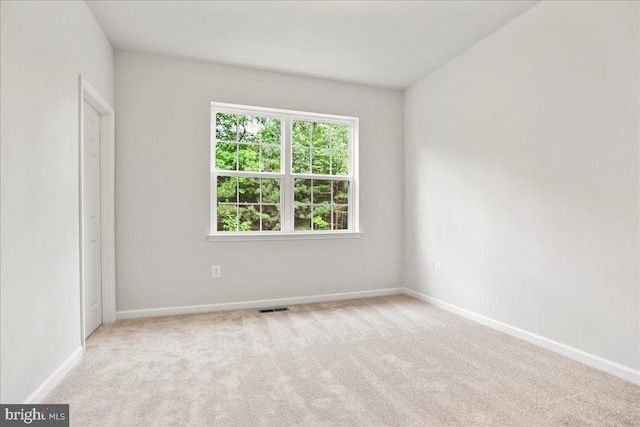 view of carpeted spare room