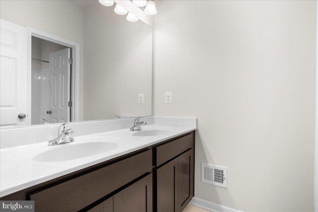 bathroom featuring vanity and walk in shower