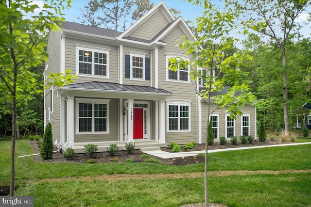 view of front of home featuring a front lawn