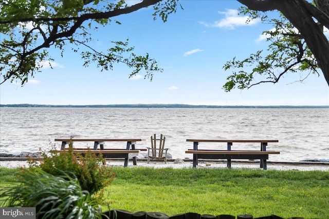 dock area featuring a water view