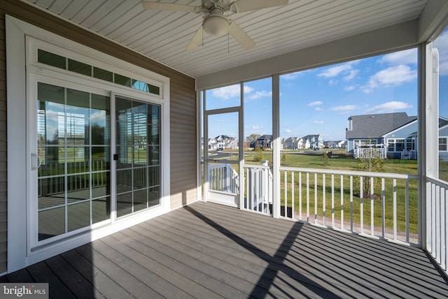 sunroom / solarium with ceiling fan