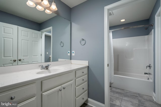 bathroom with vanity, tile patterned flooring, and shower / bathtub combination with curtain