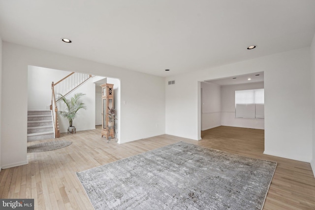 unfurnished room featuring hardwood / wood-style floors