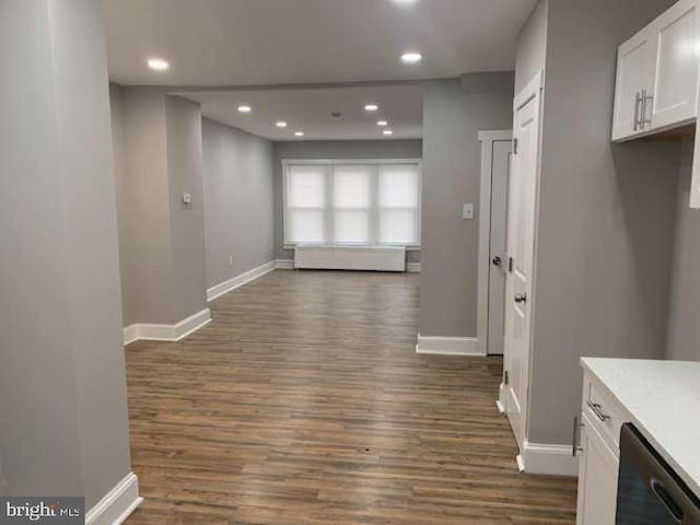 hall with dark hardwood / wood-style flooring