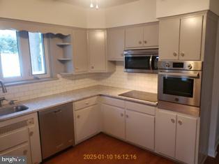 kitchen with stainless steel appliances and sink