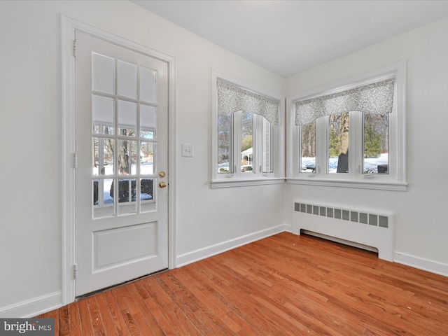 510 Ridge Rd, Orwigsburg, PA 17961 - entryway with radiator, wood finished floors, and baseboards