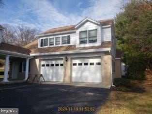 view of property exterior with a garage