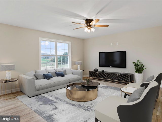 living room with light wood-type flooring and ceiling fan