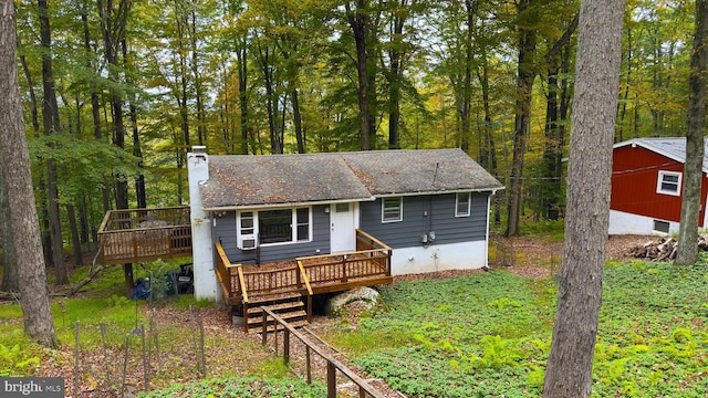 view of front of home with a deck