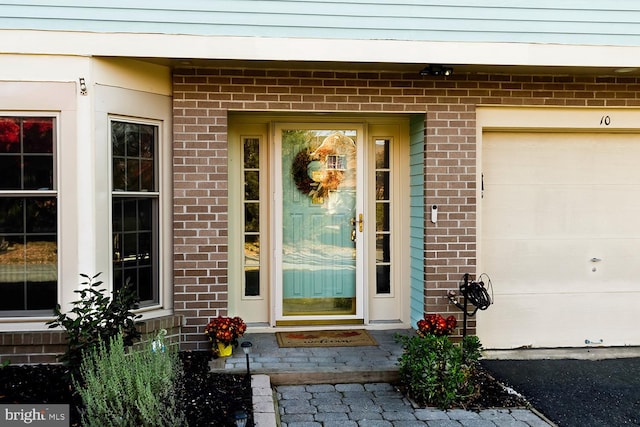 entrance to property with a garage