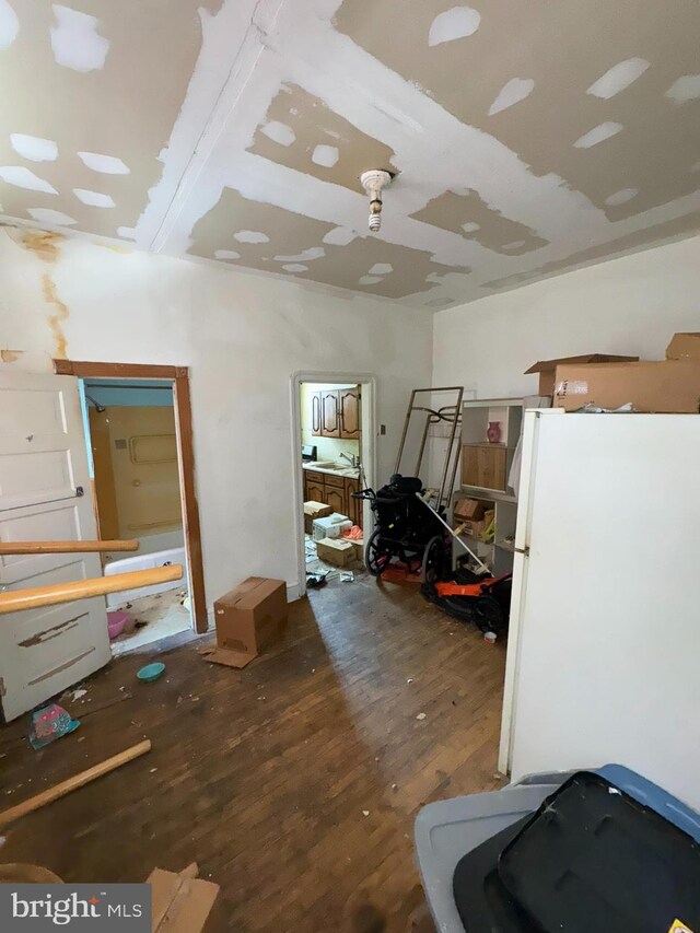 miscellaneous room featuring wood-type flooring