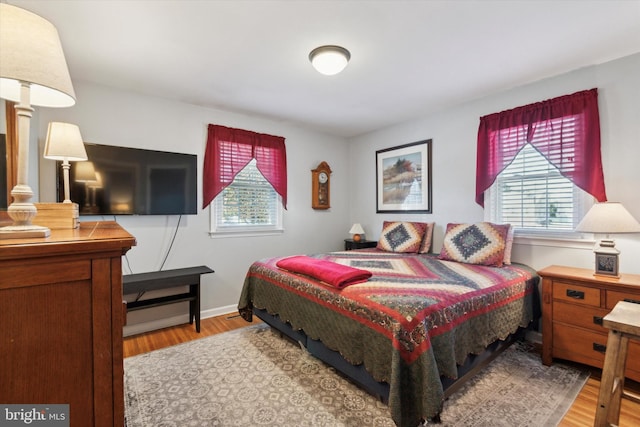 bedroom with light hardwood / wood-style flooring