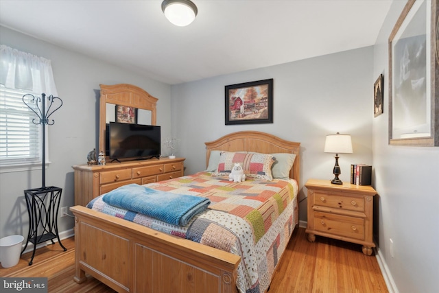 bedroom featuring light hardwood / wood-style floors