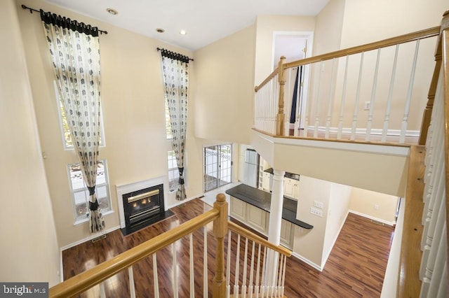 stairway featuring hardwood / wood-style flooring