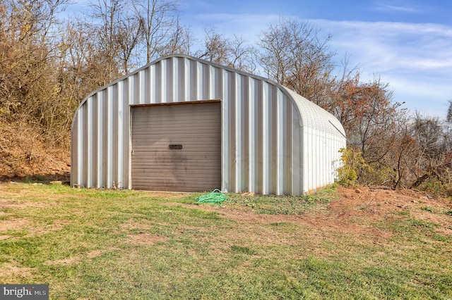 view of outdoor structure with a garage