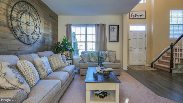 living room with carpet flooring and a wealth of natural light