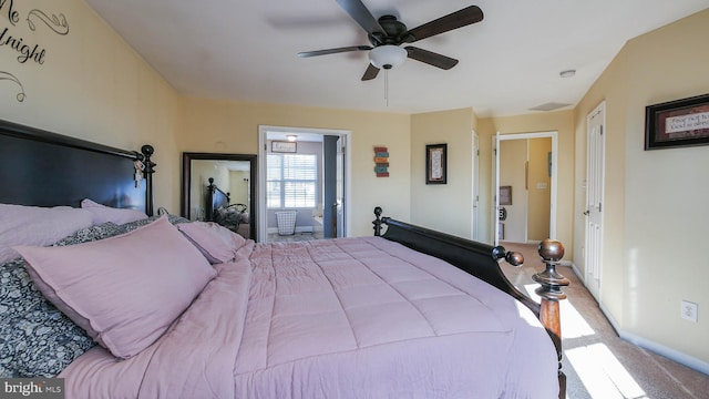 bedroom with ceiling fan and carpet floors