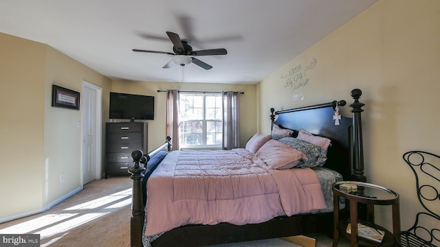 bedroom with light carpet and ceiling fan