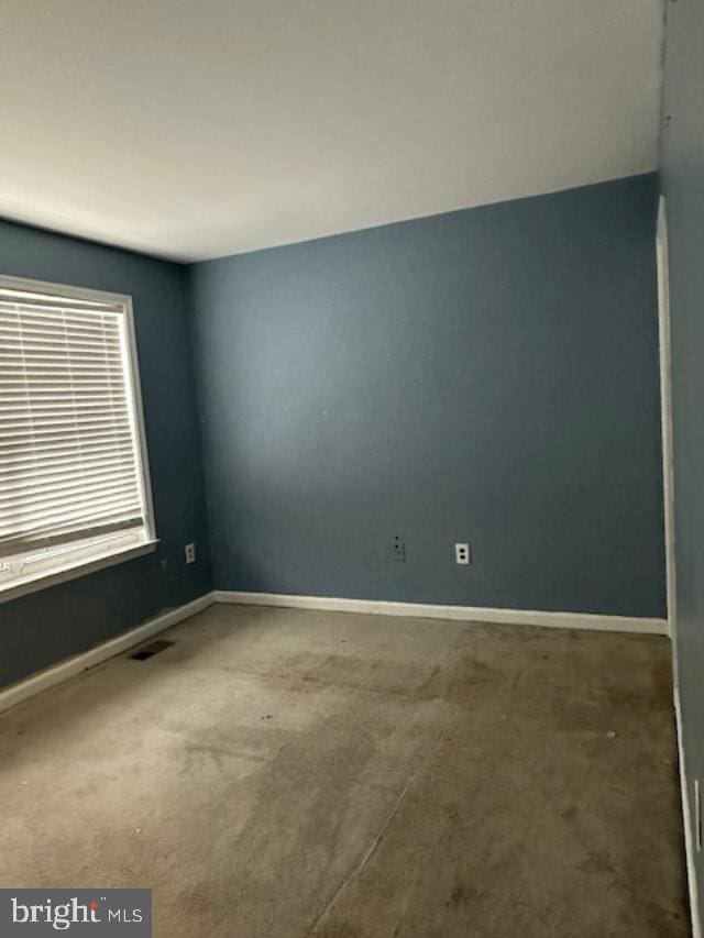 view of carpeted spare room